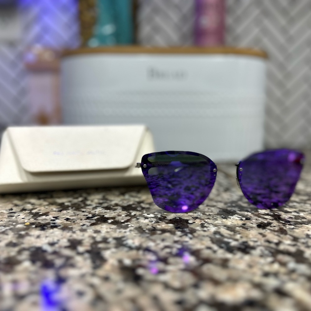 Michael Kors Sunglasses. NWOT. Never worn. Purple lenses and beautiful frame.